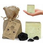 Dr. Ancient Black Rose Soap with packaging, a black rose, and soap bars on a white background
