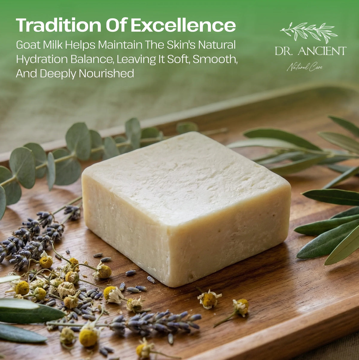 A rectangular bar of pale beige natural soap sits on a wooden board surrounded by eucalyptus leaves, dried lavender, and small yellow flowers. Text at the top reads 'Tradition Of Excellence' and 'GOAT MILK HELPS MAINTAIN THE SKIN'S NATURAL HYDRATION BALANCE, LEAVING IT SOFT, Smooth, And Deeply Nourished,' with the DR.