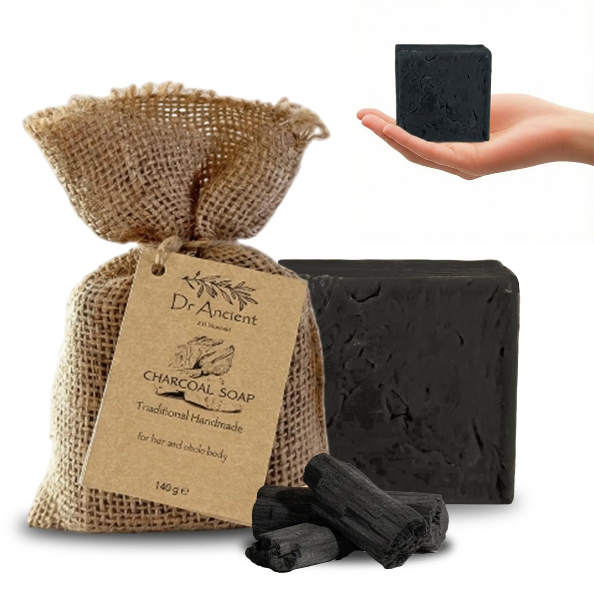 Dr. Ancient charcoal soap with packaging, soap bars, and charcoal pieces on a white background