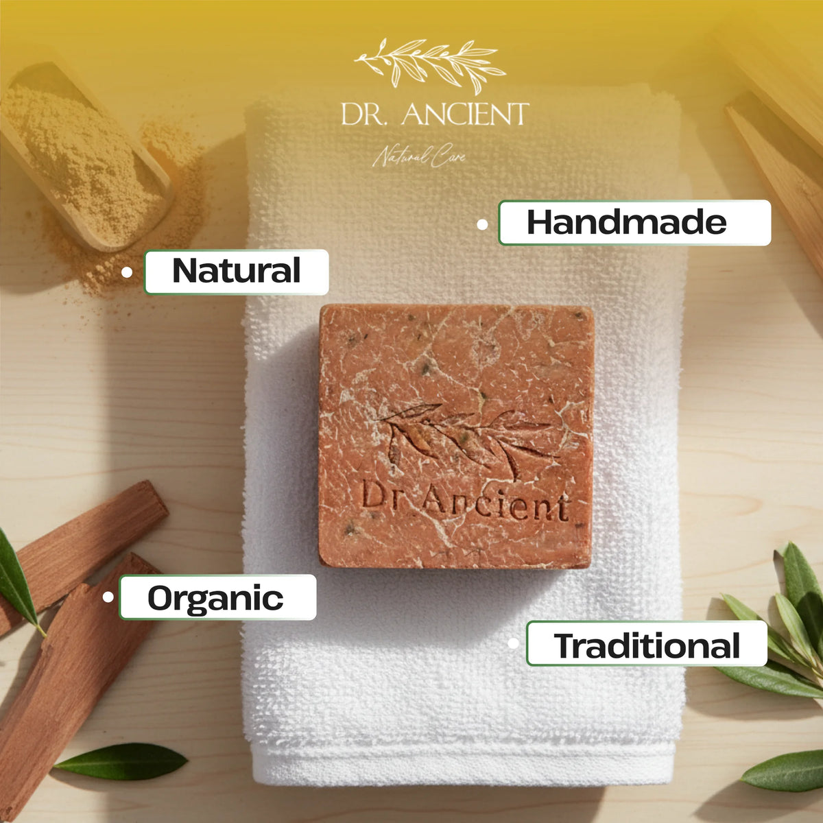 Dr. Ancient soap bar on a white towel with branding and product attributes displayed.