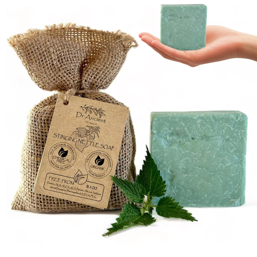 Dr. Ancient Stinging Nettle Soap with burlap bag and nettle leaves on a white background