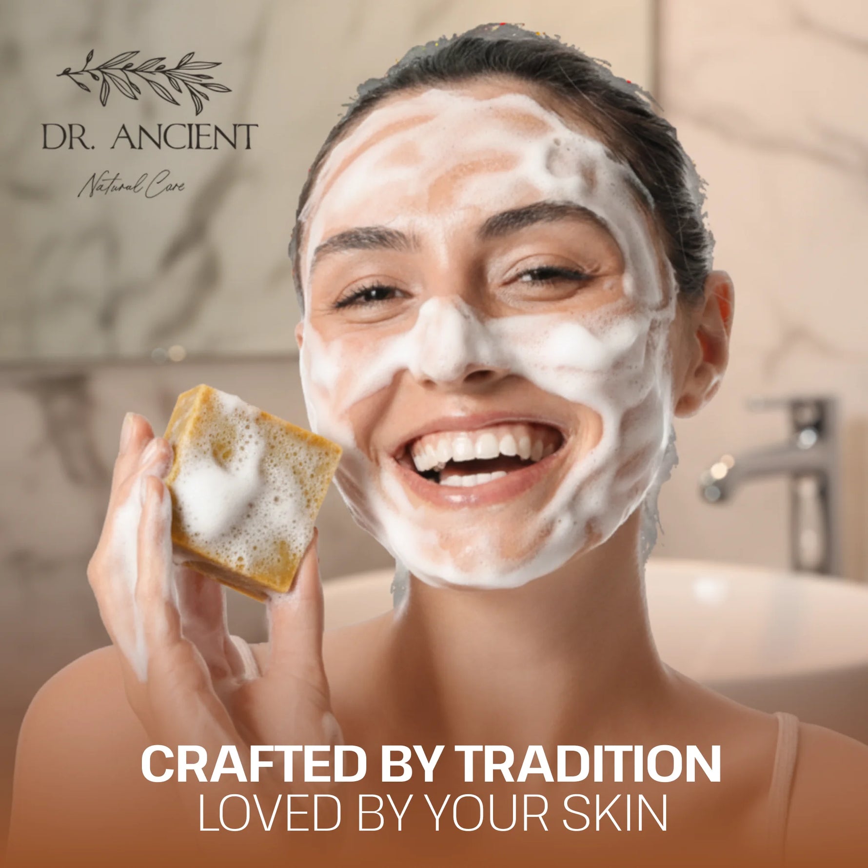 A woman with white foaming facial cleanser on her face smiles while holding a sponge in a bathroom setting. The image features the brand logo 'DR.