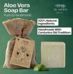 Aloe Vera Soap Bar by Dr. Ancient Natural Care, shown as a rectangular pale green soap bar next to a burlap drawstring bag with a branded paper tag, on a dark green background with promotional text.