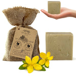 Dr. Angélique St. John's Wort Soap with burlap bag and yellow flowers on a white background