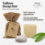 A bar of Dr. Ancient Tallow Soap shown with its burlap drawstring bag, a small white lather sample, and green leaves on a light background.