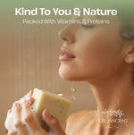 Person holding a bar of soap with a blurred shower background, featuring 'Dr. Ancient' branding.