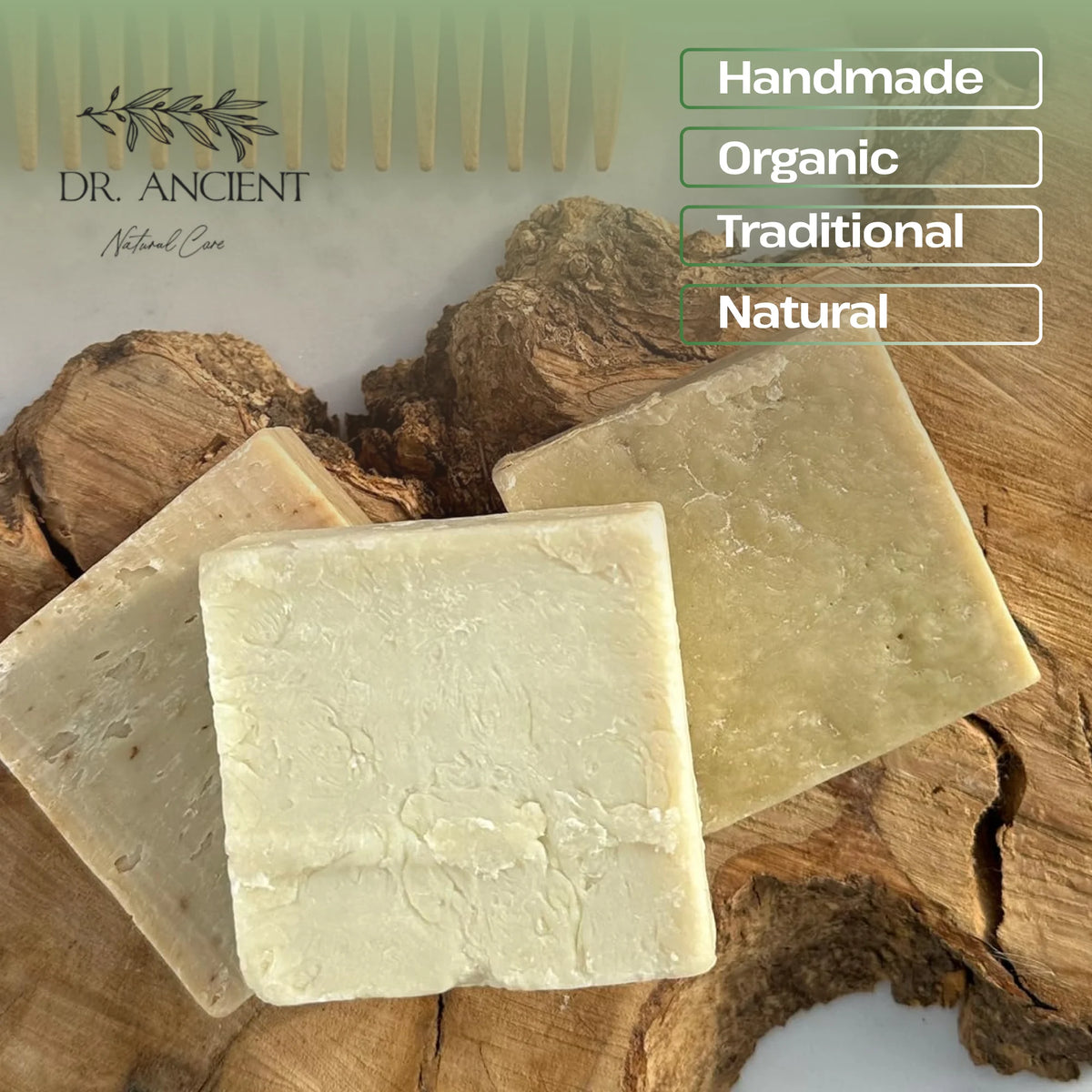 Three rectangular bars of natural soap in warm cream and light tan shades, arranged on a rustic wood slice background. The image includes branding for Dr.