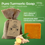 Pure Turmeric Soap from Dr. Ancient with packaging and ingredients on a green background